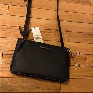 Calvin Klein Denver Perforated Crossbody in Black